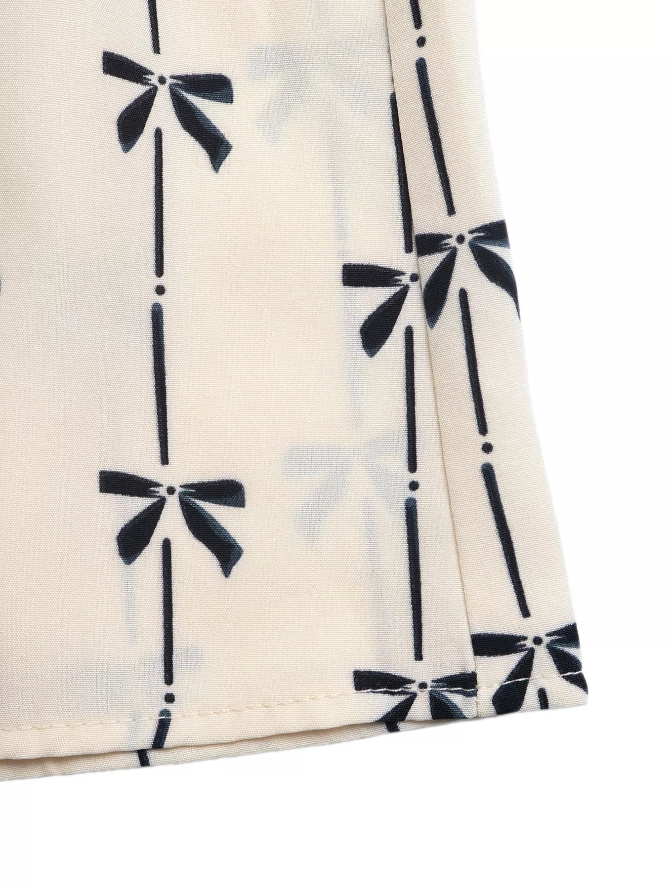 Bow Print Smocked Halter Neck Romper
