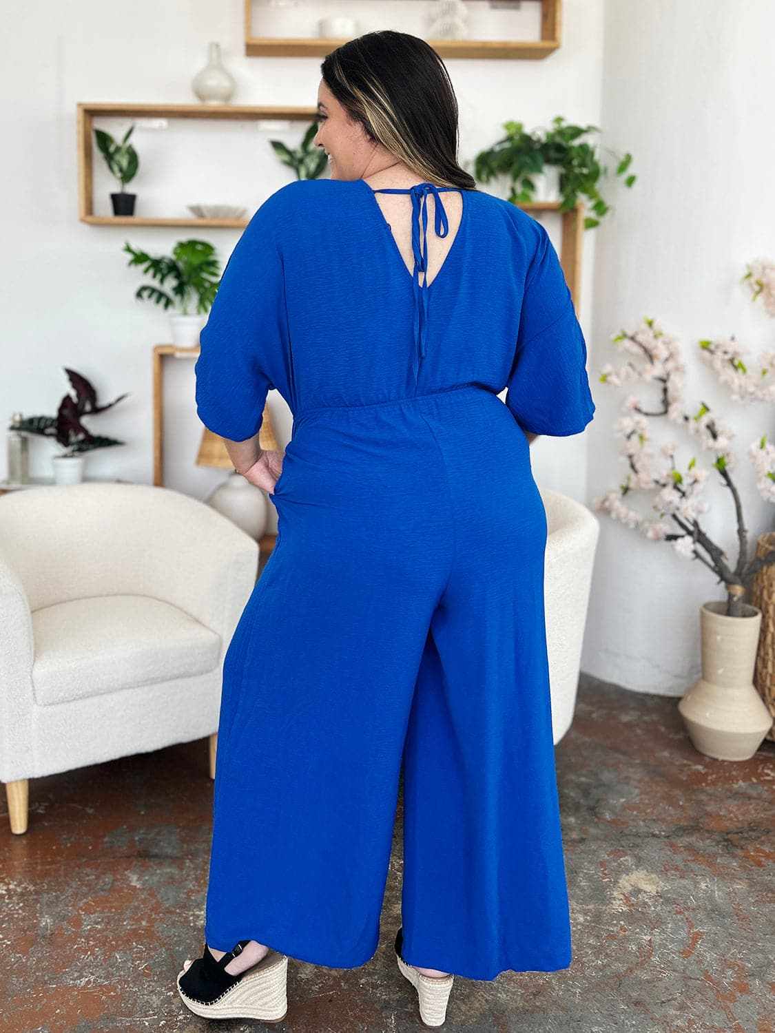 Trendsi Surplice Wide Leg Jumpsuit - Chic & Elegant