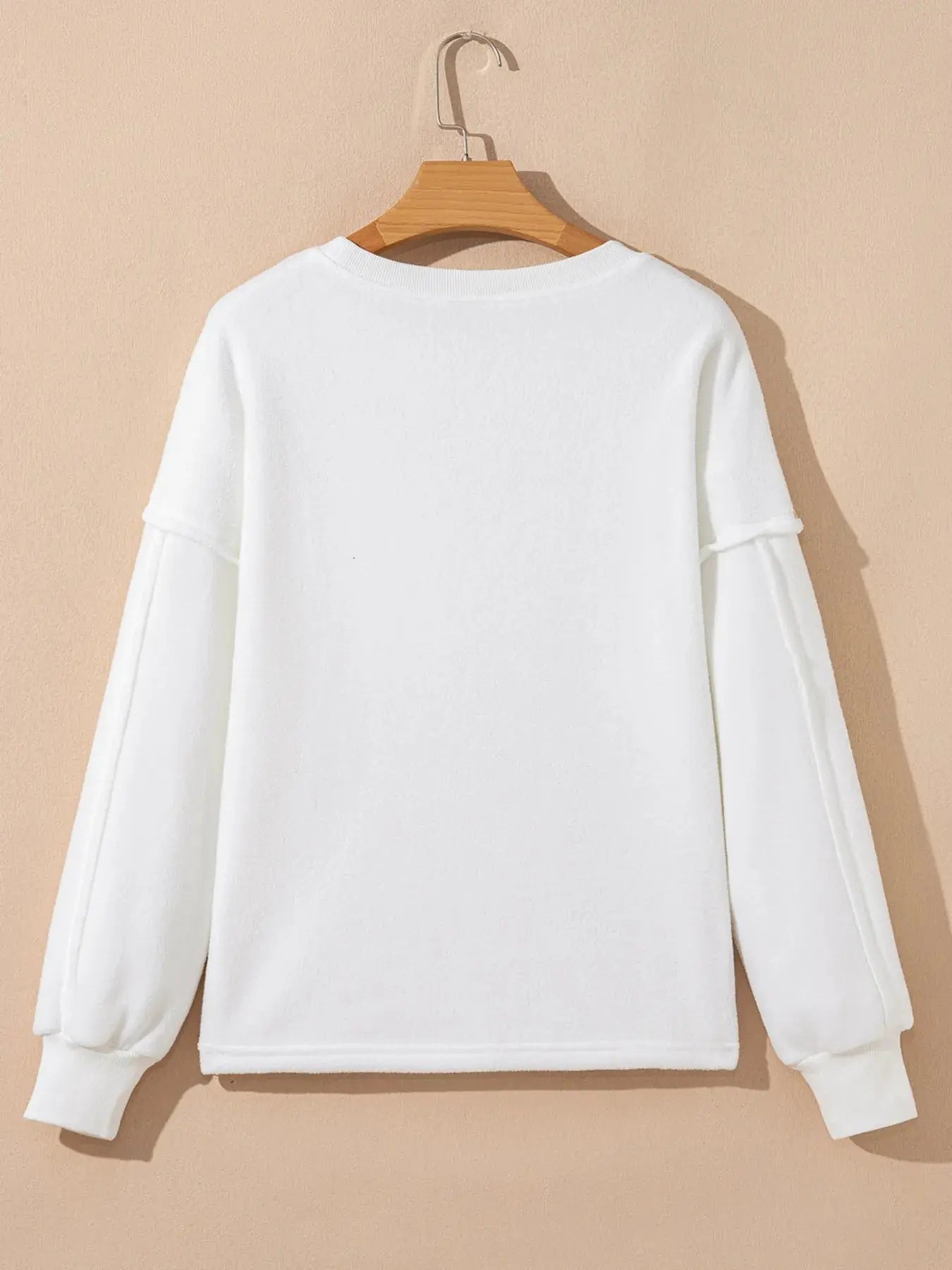 Cozy Cream Exposed Seam Knit Pocket Pullover Sweatshirt