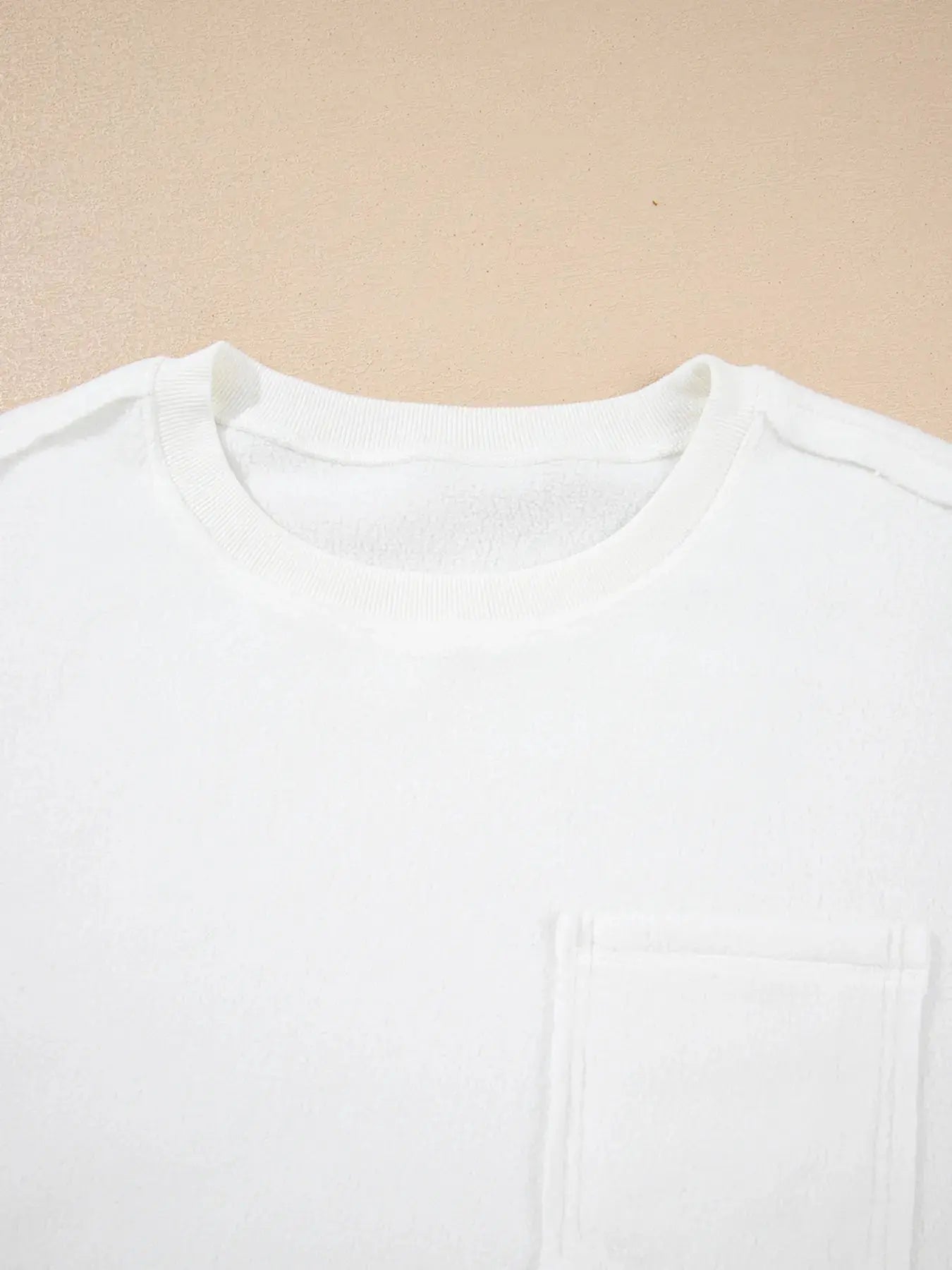 Cozy Cream Exposed Seam Knit Pocket Pullover Sweatshirt