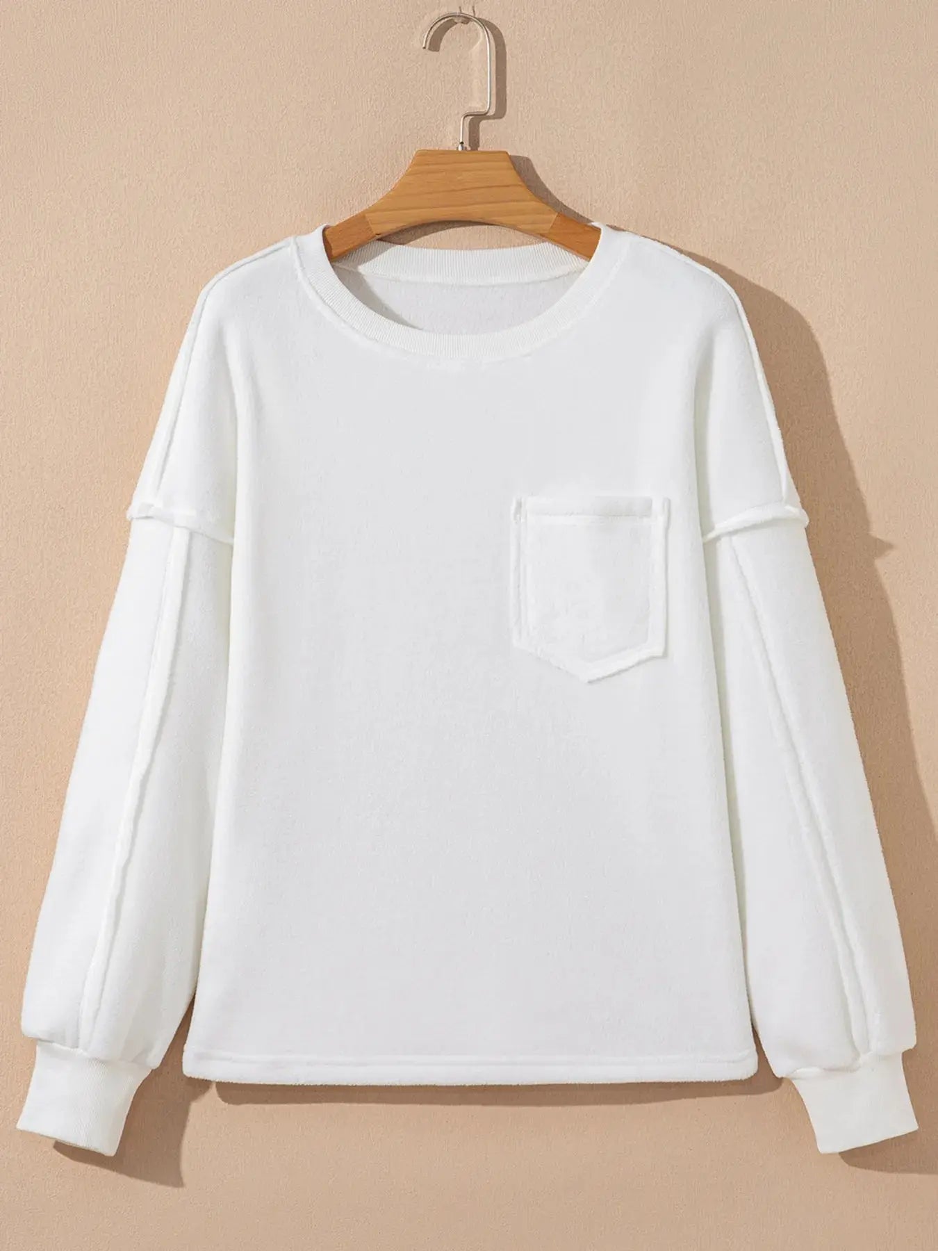 Cozy Cream Exposed Seam Knit Pocket Pullover Sweatshirt