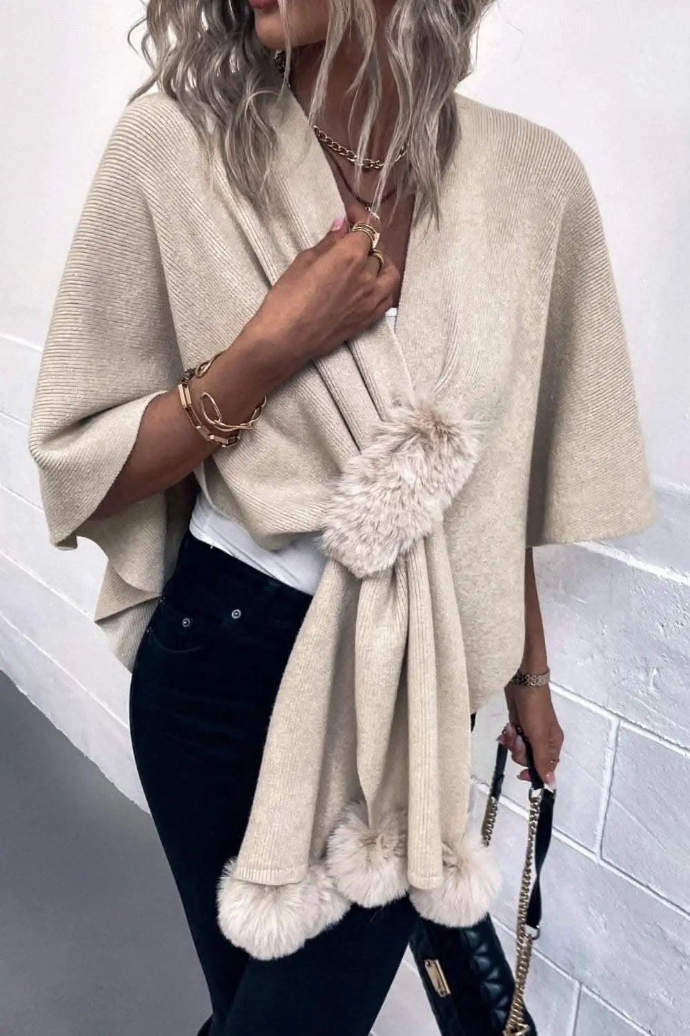 Ponchos Trendsi Chic poncho with pom-pom trim