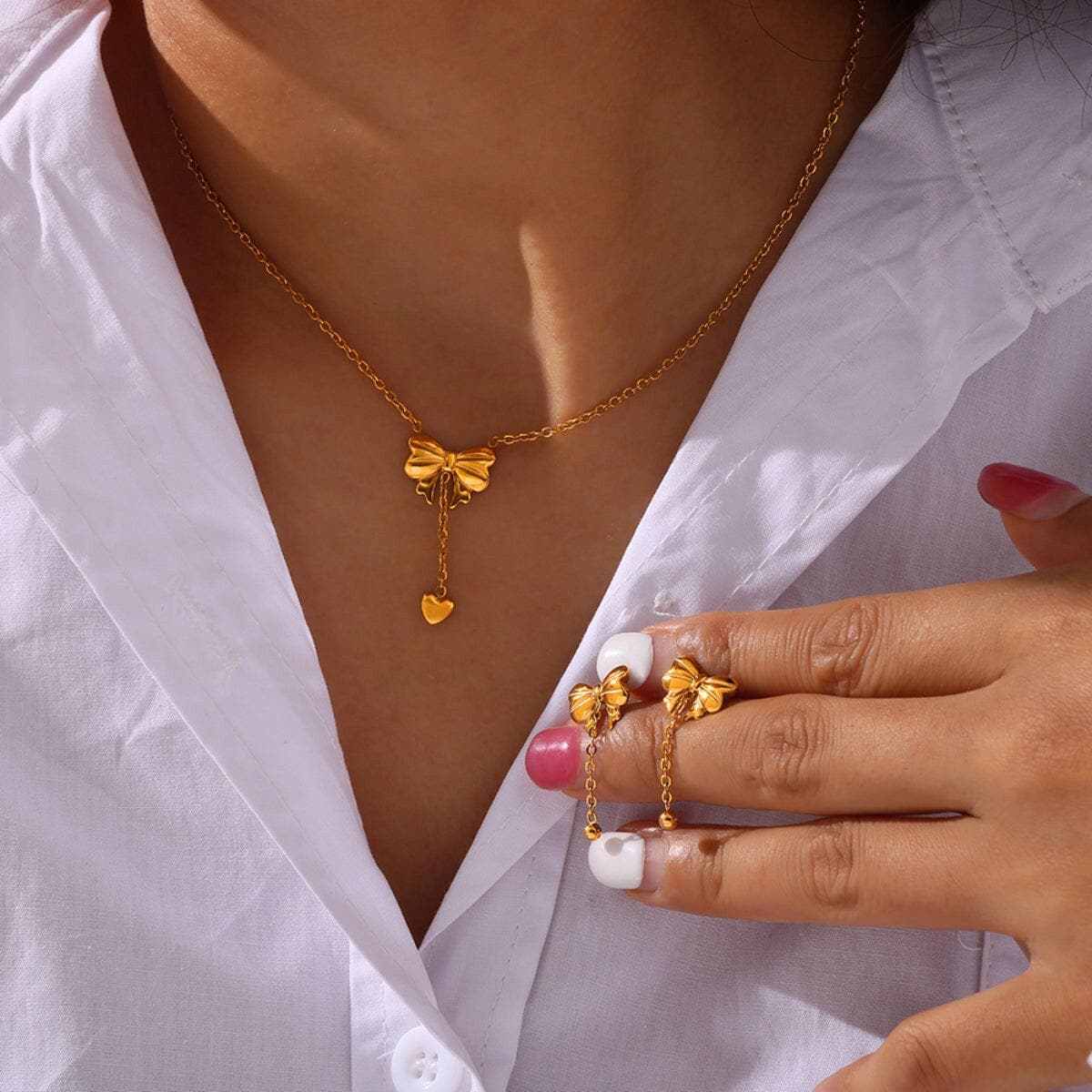T-Shirts Trendsi Titanium steel gold bow necklace