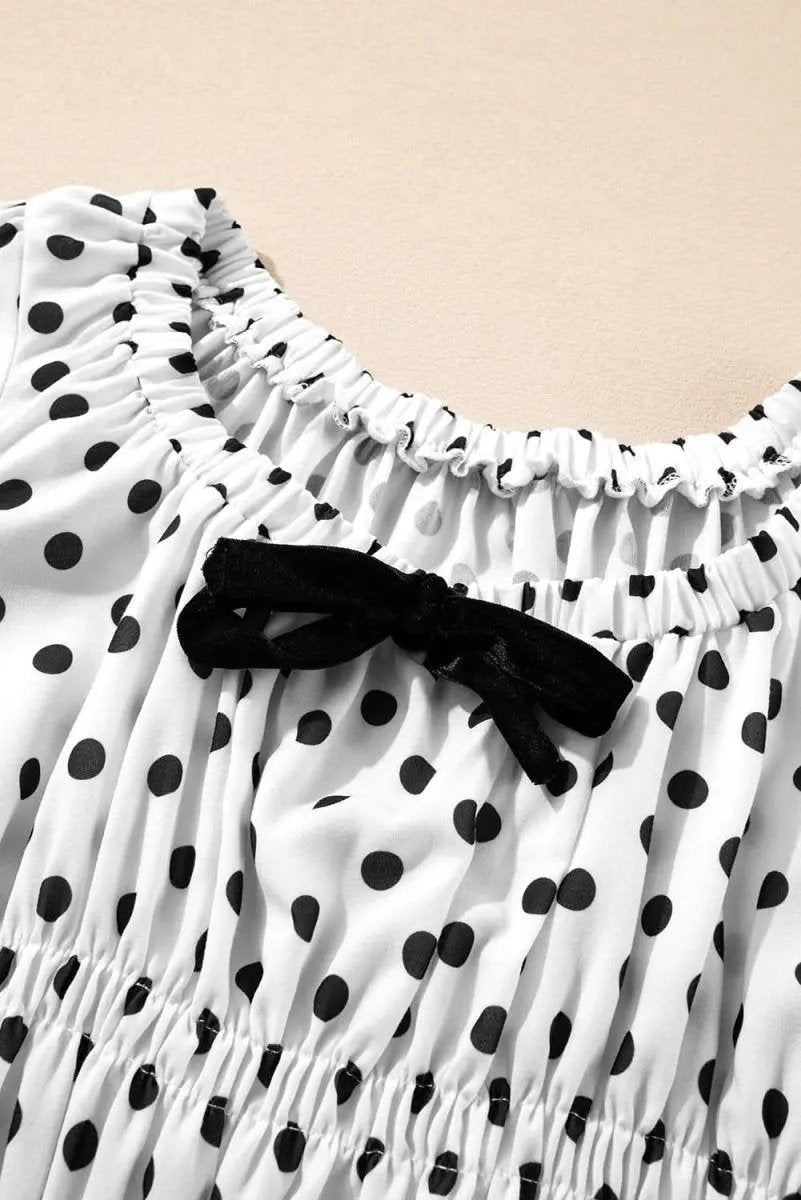 Love Salve Black Polka Dot Peplum Top With Bow Detail
