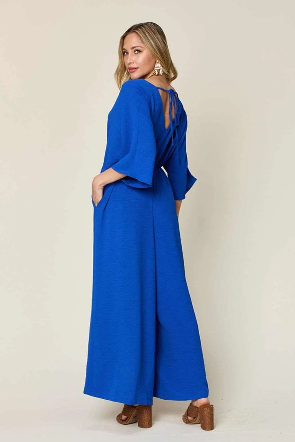 Trendsi Surplice Wide Leg Jumpsuit - Chic & Elegant