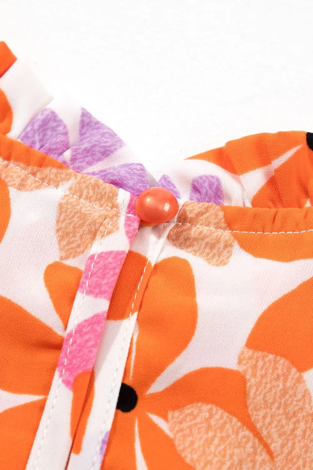 Floral Smocked Top with Ruffled Sleeves | Love Salve